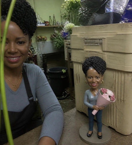 A customer holding their Clayfie clay mini