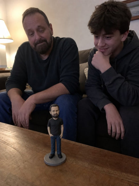 A customer holding their Clayfie clay mini